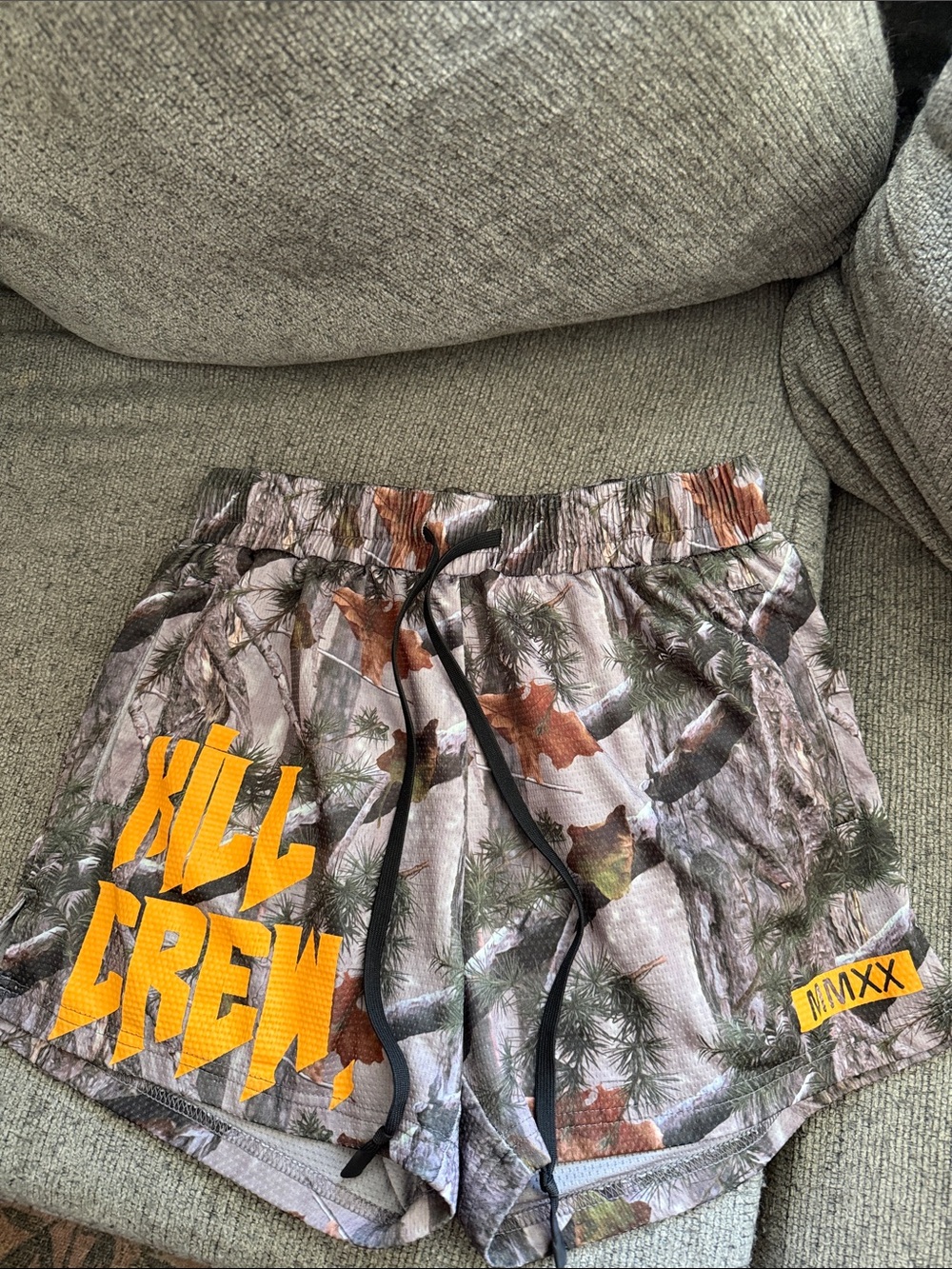 Kill Crew Camo Athletic Shorts with orange Logo
